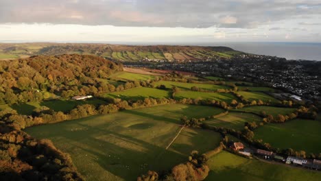 aerial shot flying over an idyllic nature reserve in devon on the english coast