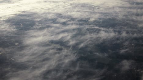 Vista-Aérea-Del-Planeta-Tierra-Desde-La-Ventana-Del-Avión.