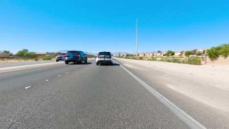 pov of car driving down the road