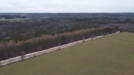 Agricultural-Farmland-Surrounded-By-Natural-Forest-Landscape,-Caledon