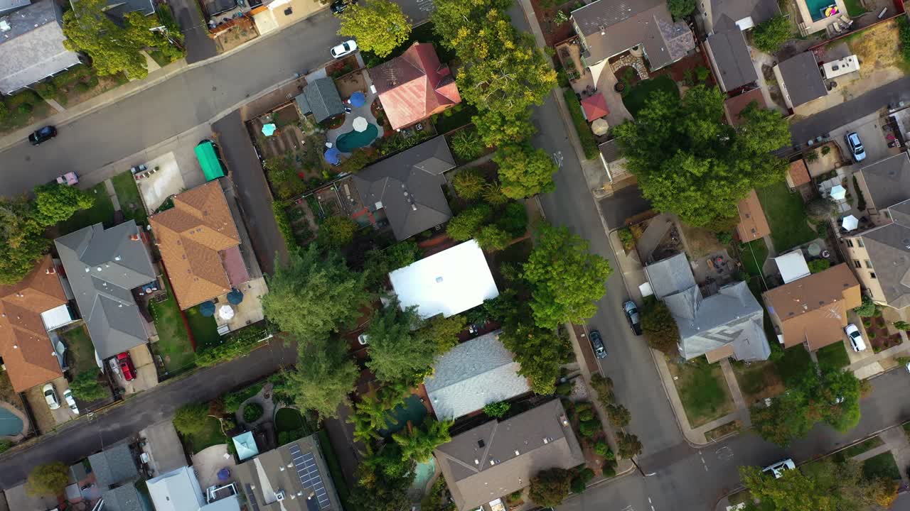 Aerial view over a neighborhood in sunny Roseville, USA - top down, drone shot