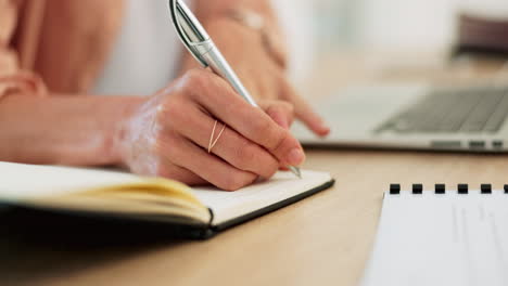 hand, writing and notebook with a business woman