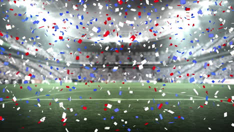animación de confeti azul y rojo cayendo sobre el estadio deportivo