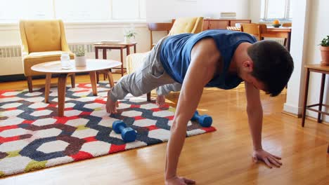 Man-exercising-in-living-room-4k