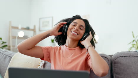 Music-headphones,-laptop-and-woman-dance-on-sofa