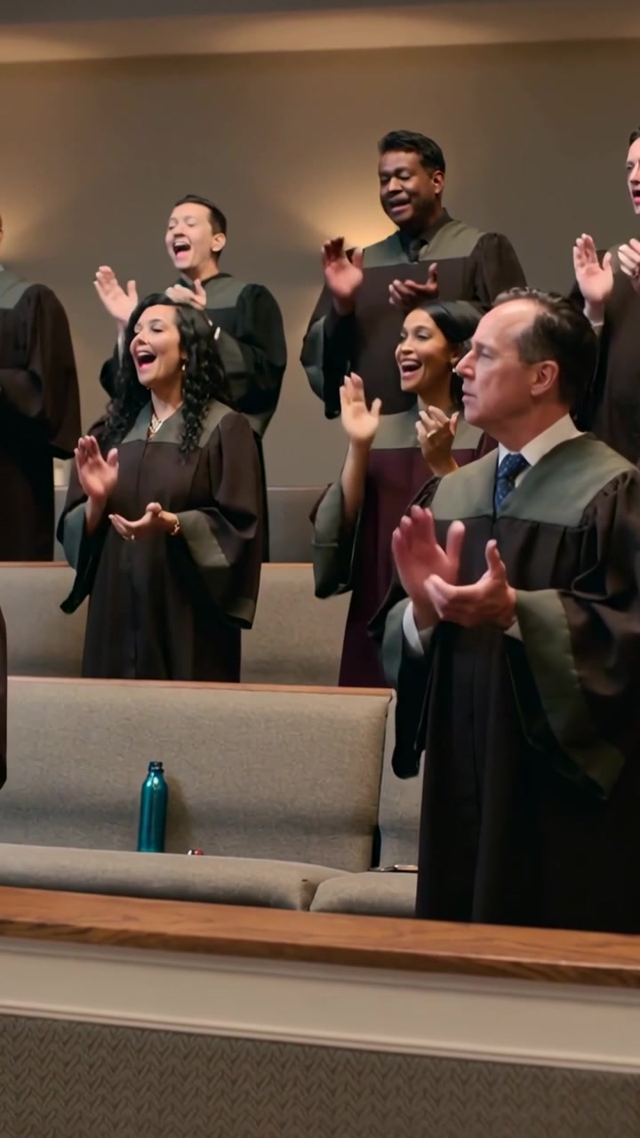 Vertical video: Cue starting choir singing, clapping for worship in church, turquoise bottle, robes