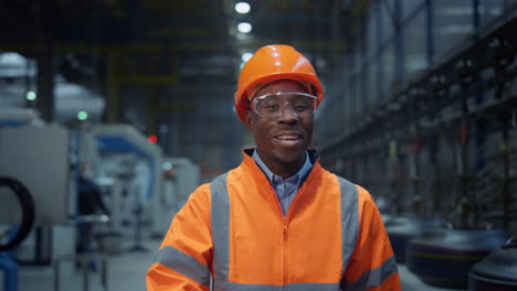 african american worker smiling at modern digital production factory portrait