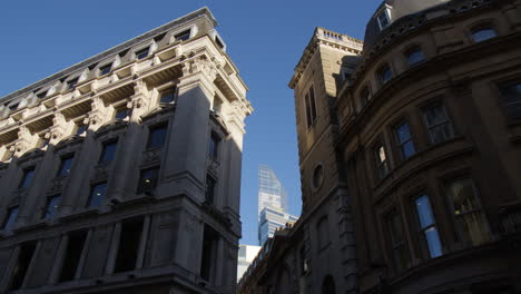 typical english buildings along king william street in london, united kingdom