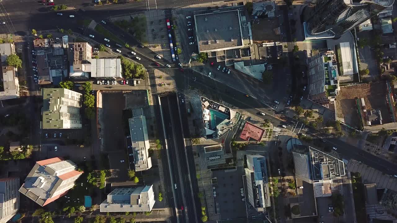 Santiago De Chile, Spinning Birdseye Aerial View of Street Traffic on Intersection in Modern Neighborhood