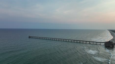 Bob-Hall-Pier-And-Beach-In-Padre-Island,-Corpus-Christi,-Texas---aerial-drone-shot