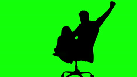 Silhouette-Eines-Mannes,-Der-Einen-Drehstuhl-Dreht,-Auf-Einem-Greenscreen