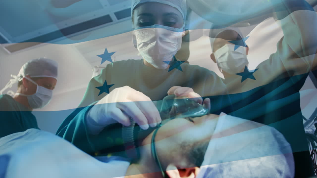 Animation of flag of honduras waving over surgeons in operating theatre