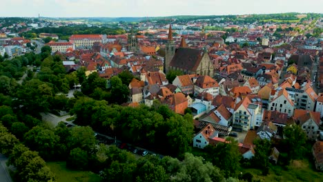 4k aerial drone video of the st. johannis kirche church, kirche st. gumbertus church, and markgrafenschloss residence palace in ansbach, germany