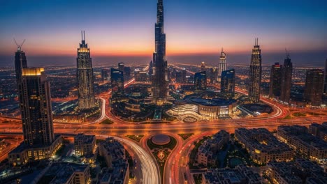 dubai cityscape at night with burj khalifa and illuminated skyscrapers