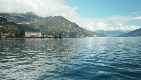 aerial: boats sailing near the coast of menaggio on a lake como