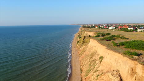 a marvelous landslide seashore next to the village 4k 30 fps