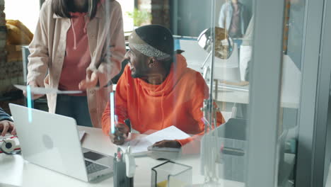 diverse team meeting in modern office