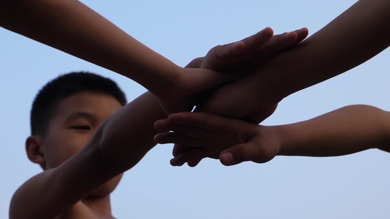 Children Joining Hands