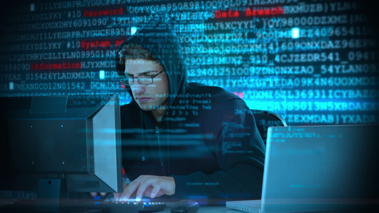 Composite video of hacker using laptop