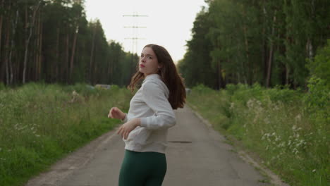 woman running on a forest path