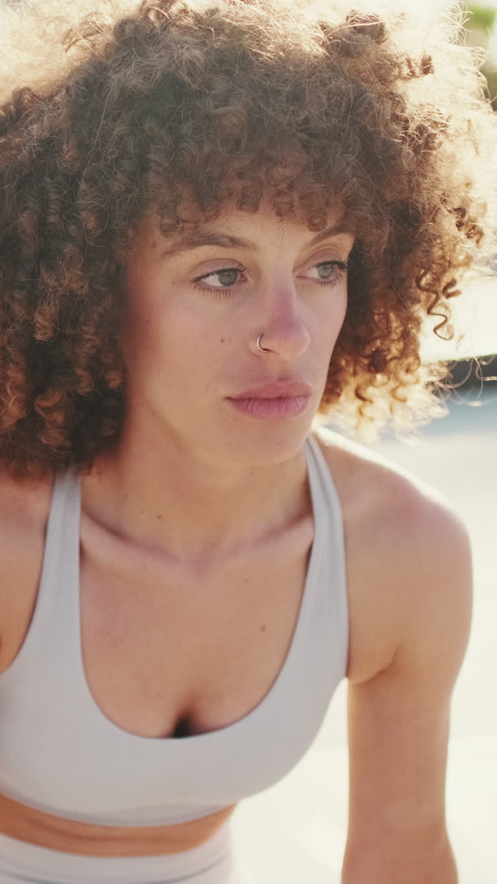 Fitness Woman Focuses on Wellbeing in Skate Park