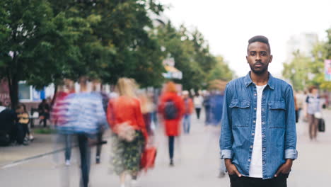 man standing on a city street.