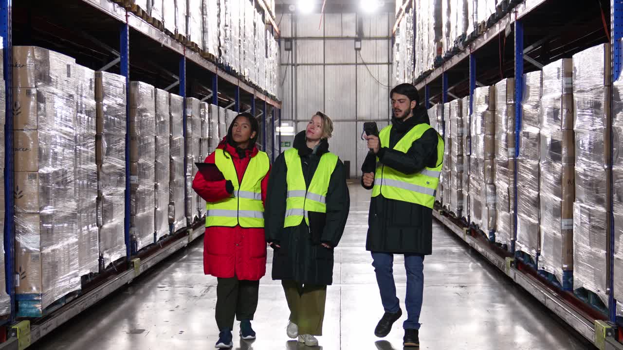 Warehouse Workers Inspecting Inventory