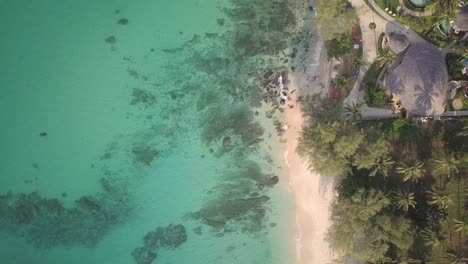 Aerial-View-Of-Beautiful-Tropical-Beach-In-Koh-Kood-Island-In-Thailand-With-Turquoise-Blue-Sea-On-A-Sunny-Summer-Day