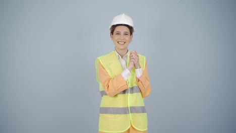 engineer making a sign of confidence at the camera.