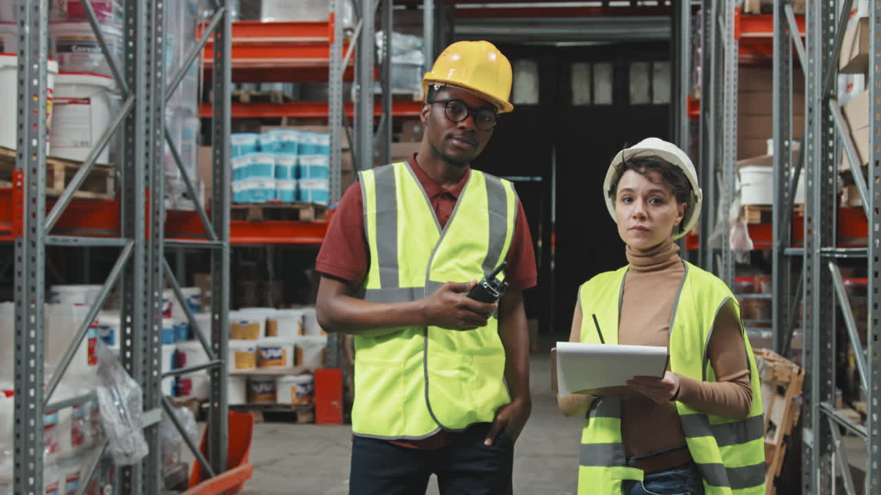 Warehouse Workers Talking and Posing
