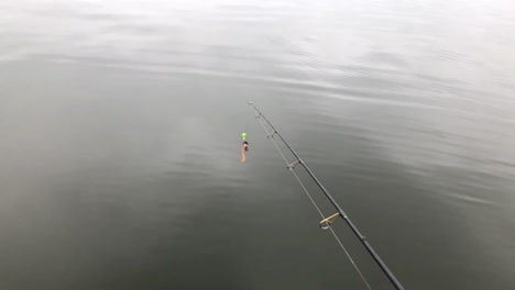 fishing pole on fishing boat in summer