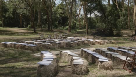 rustic outdoor wedding ceremony setup in a forest