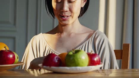 woman selecting fruit