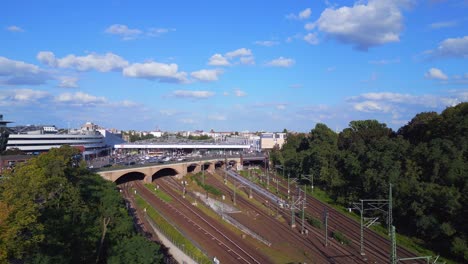 Lovely-aerial-top-view-flight-tracks-suburban-train-Platform-S-Bahn-Station-bridge,-Berlin-mitte-summer-2023