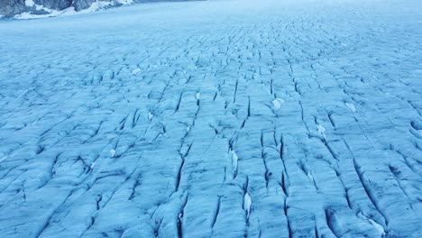 Flying-over-surface-of-Tunesbergdalsbreen-glacier-in-Norway