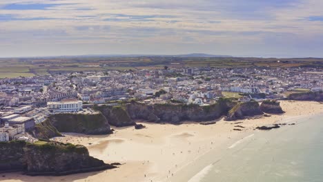 Wide-aerial-shot-over-the-private-beach-at-Lusty-Glaze-in-Newquay-Cornwall