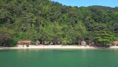 magic aerial view flight cabins on jungle white sandy beach island koh chang thailand 2022