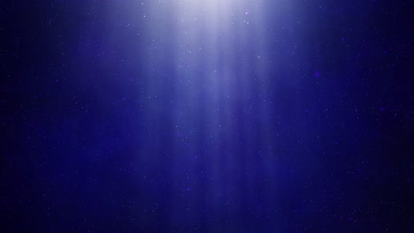 abstract blue light rays and particles background