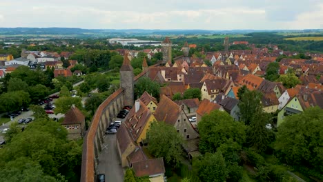 4k aerial drone video of the thomas, womens, röderturm, and hohenner towers on the walled city of rothenburg, germany