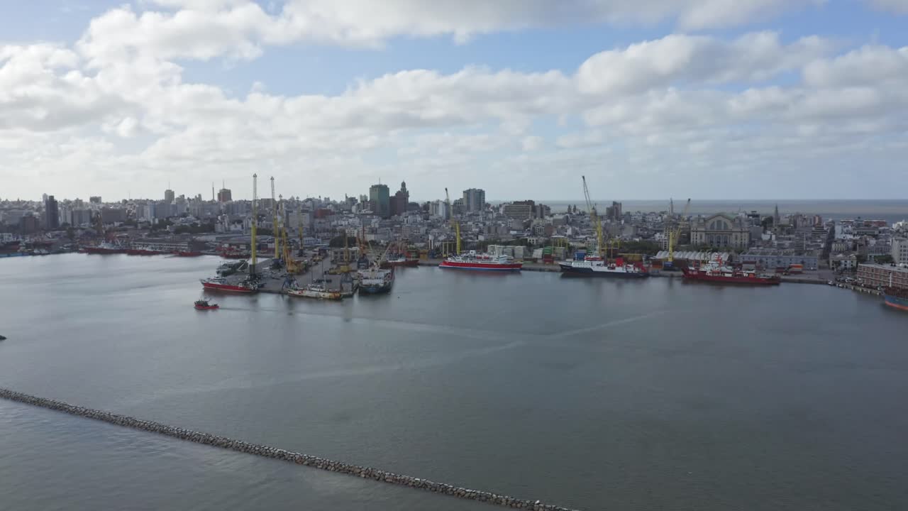 Uruguay capital city Montevideo. Static aerial drone view of barrio Ciudad Vieja, seen from above the port. Calm cloudy weather