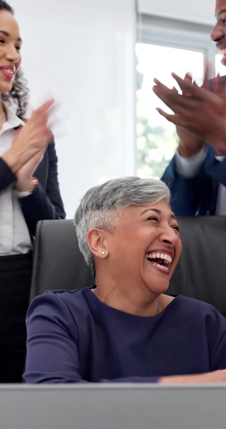 Diverse Business Team Celebrating Success in Office