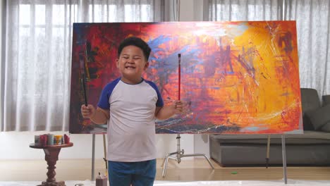 happy boy painting