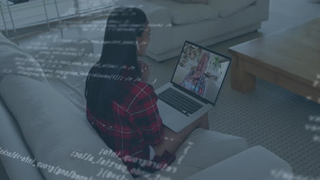 Animation of data processing over woman using laptop on video call in background