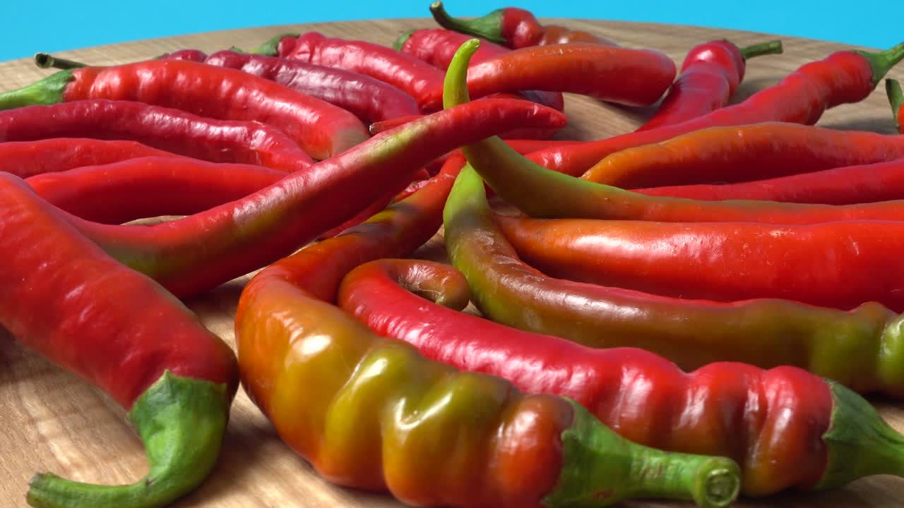 Red chilli, pepper. Shooting in the movement