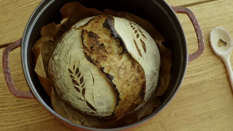 homemade artisan sourdough bread in cast iron pot