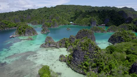 raja ampat aerial of the beach and reef on a hot sunny day