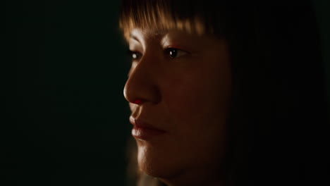 adult mexican lady portrait in the dark