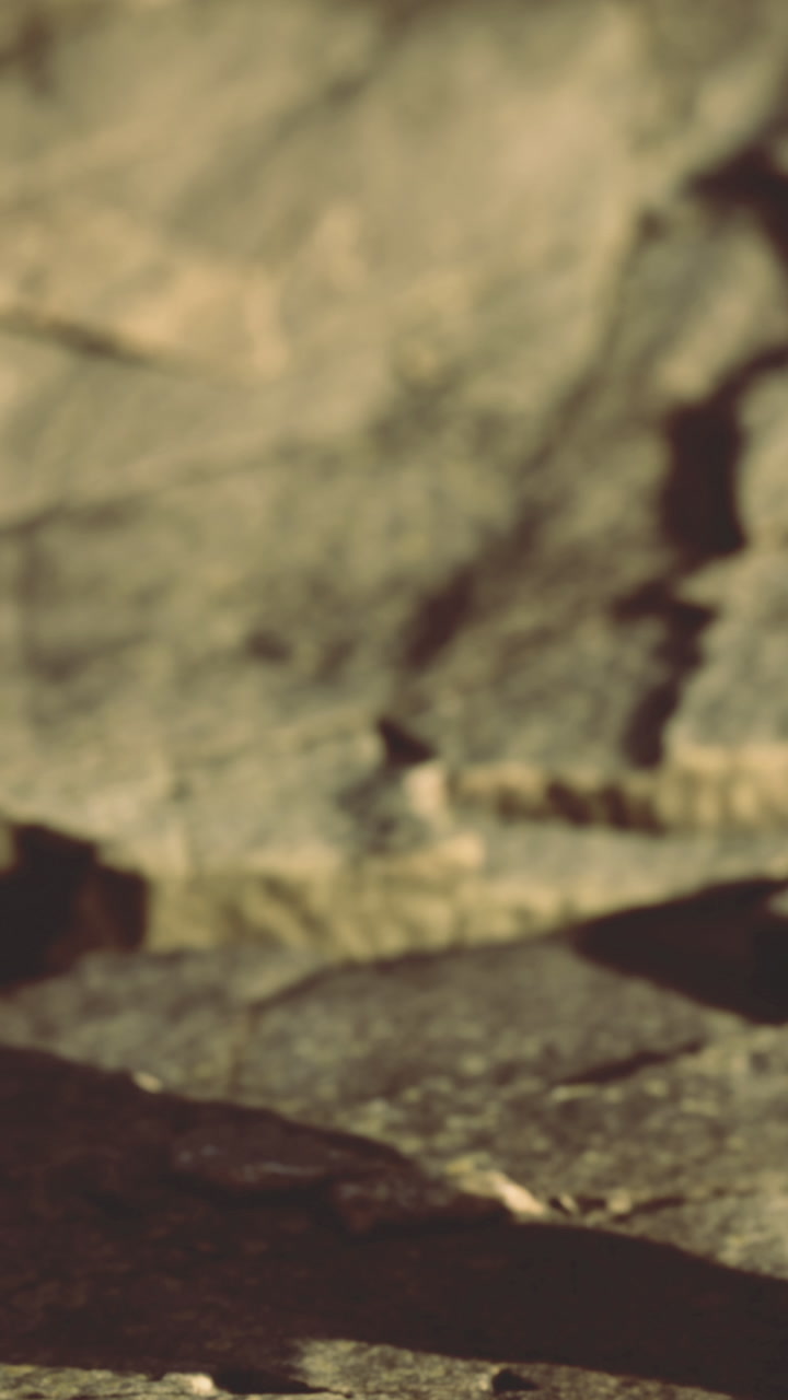 Scene showing rocky terrain during daytime in a remote area with nature