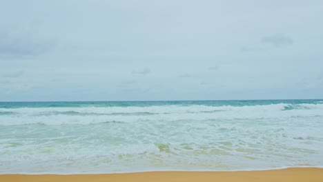 sea waves seamless loop on the white phuket sand beach