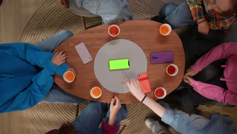 friends gathering around a table